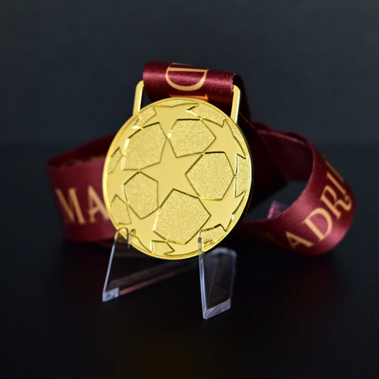 2010 UEFA Champions League Medal Back View, Inter Milan Champion Gold Alloy Medal with Starball Pattern, Commemorative Football Medal Close-up on Clear Stand