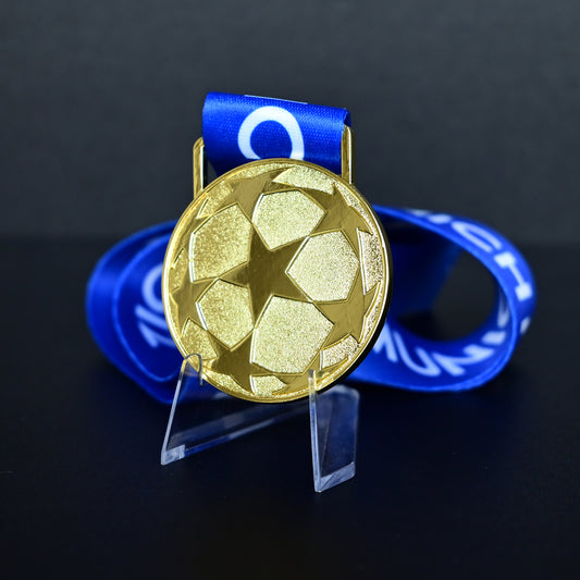 2012 UEFA Champions League Medal Back View, Chelsea Champion Gold Alloy Medal with Starball Pattern, Commemorative Football Medal Close-up on Clear Stand