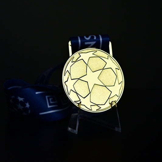 2007 UEFA Champions League Medal Back View, AC Milan Champion Gold Alloy Medal with Starball Pattern, Commemorative Football Medal Close-up on Clear Stand