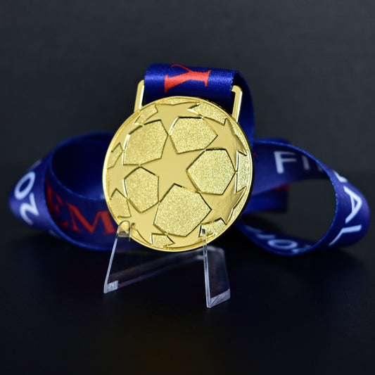2011 UEFA Champions League Medal Back View, Barcelona Champion Gold Alloy Medal with Starball Pattern, Commemorative Football Medal Close-up on Clear Stand