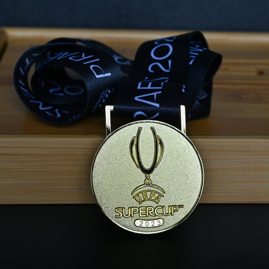 2023 UEFA Super Cup Medal Front View, Manchester City Champion Gold Alloy Medal with Official UEFA Logo, Athens Final Commemorative Medal on Clear Display Stand, Football Fan Collectible