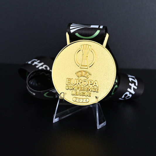 2024 UEFA Europa Conference League Medal Front View, Olympiacos Champion Gold Alloy Medal with Official UECL Logo, Athens Final Commemorative Medal on Clear Display Stand, Football Fan Collectible