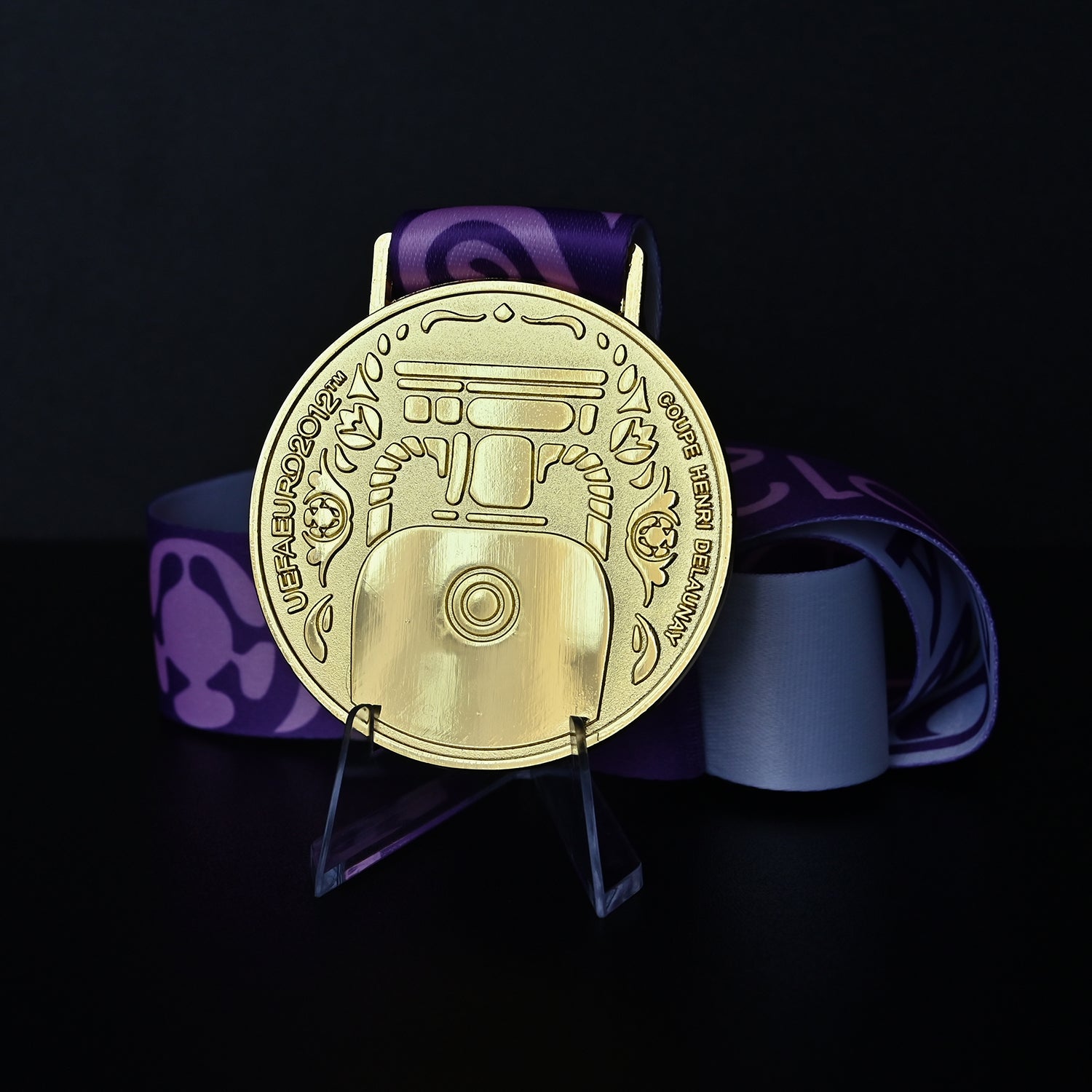 UEFA Euro 2012 medal, back Coupe Henri Delaunay design, purple patterned ribbon, Poland-Ukraine tournament, high-quality collectible, fan gift