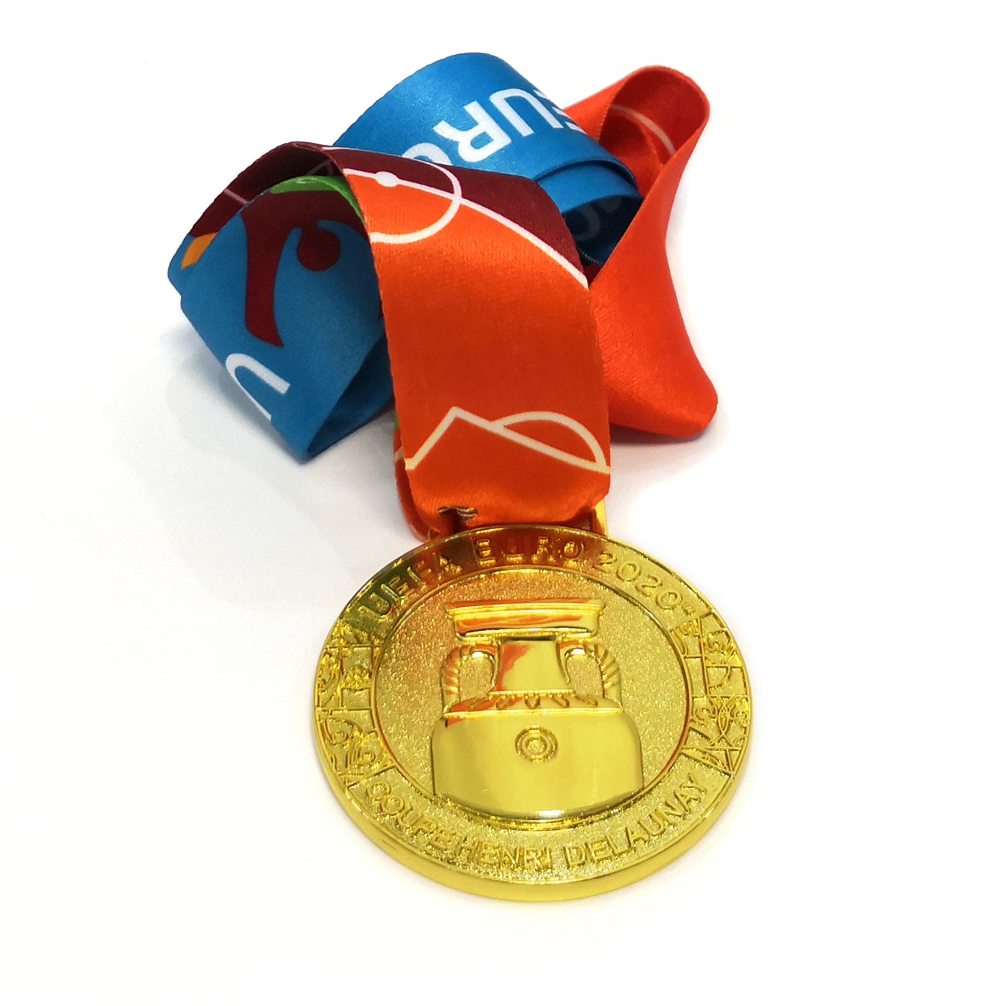 Flat lay of UEFA Euro 2020 medal with full ribbon, white background. Detailed engraving, premium finish, ideal for collection and gifting.