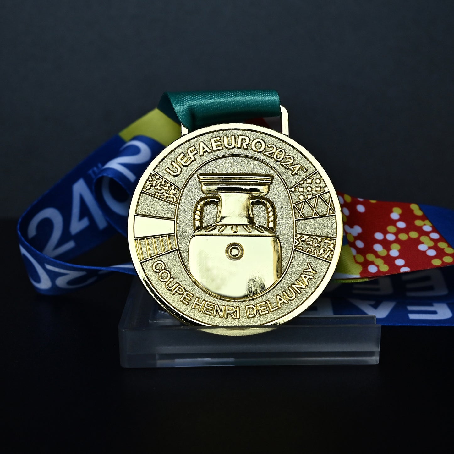 UEFA Euro 2024 championship medal, Coupe Henri Delaunay design, colorful tournament ribbon, premium football collectible, Spain Berlin final souvenir
