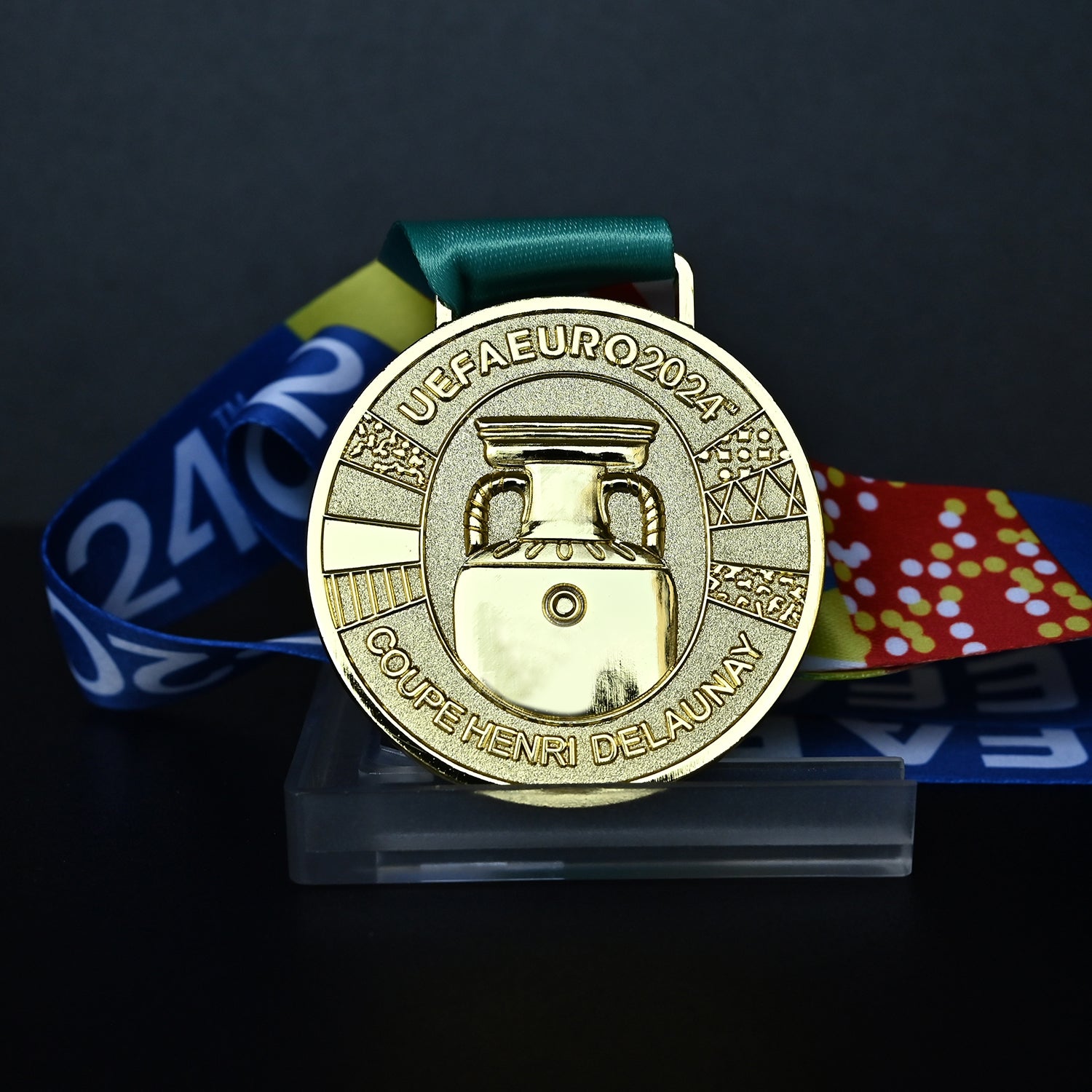 UEFA Euro 2024 championship medal, Coupe Henri Delaunay design, colorful tournament ribbon, premium football collectible, Spain Berlin final souvenir