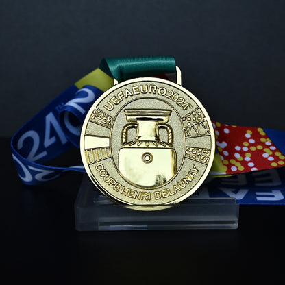 UEFA Euro 2024 championship medal, Coupe Henri Delaunay design, colorful tournament ribbon, premium football collectible, Spain Berlin final souvenir